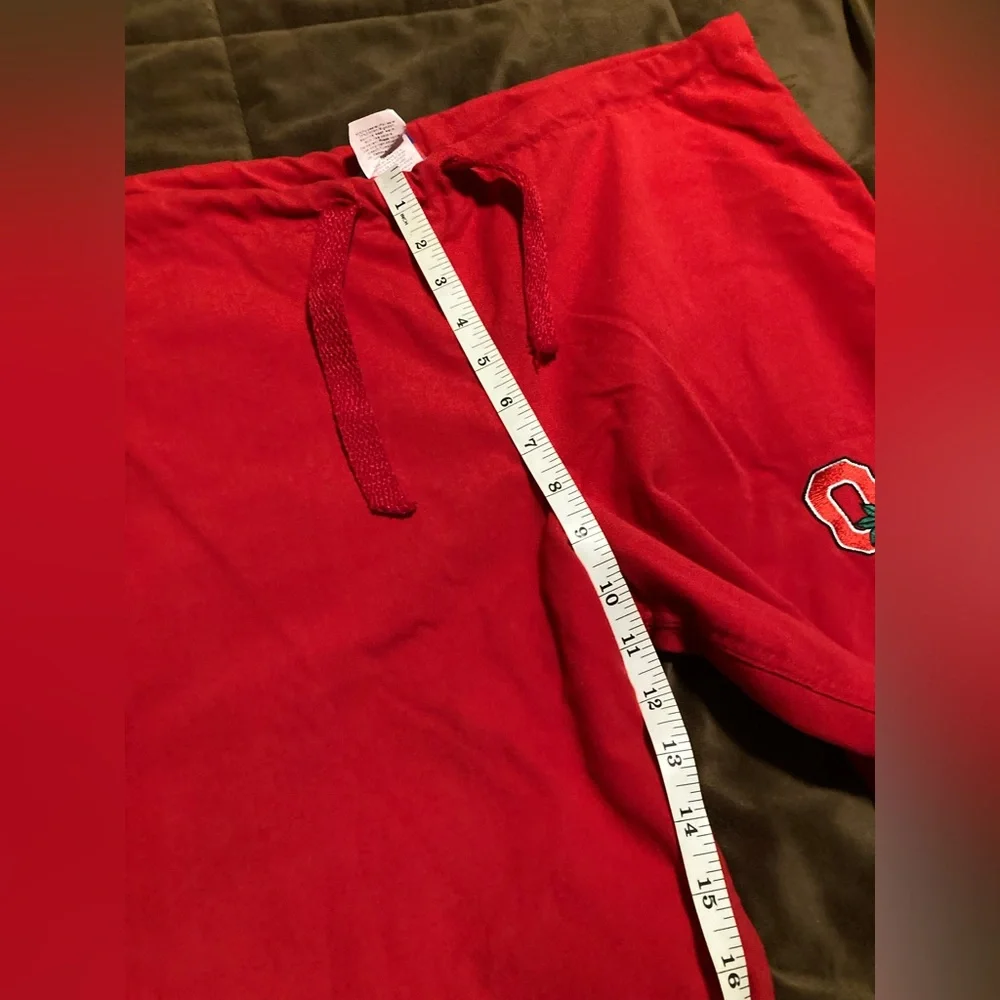 Red Ohio State Buckeyes scrub pants, size medium, small stain under pocket